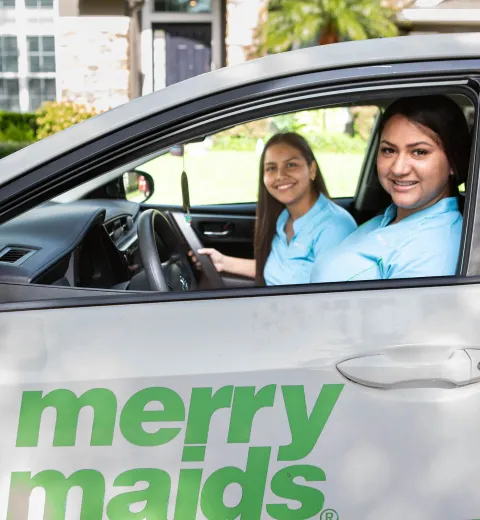 merry maids sitting in a branded vehicle