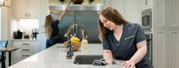 Team Members Cleaning a Kitchen