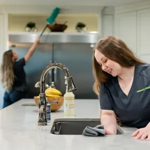 Team Member Cleaning Kitchen